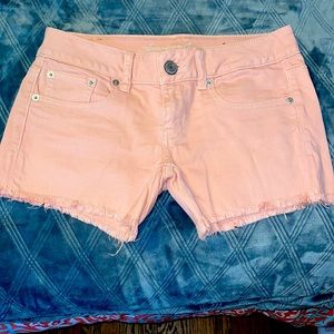 American Eagle pink denim shorts